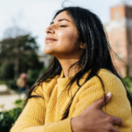 woman-hugging-herself-self-compassion